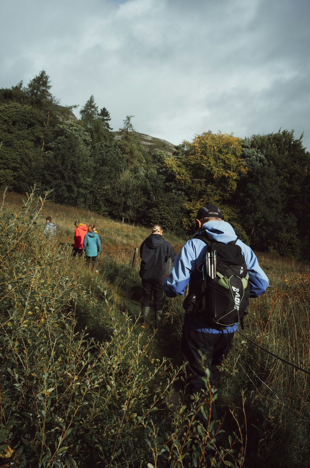 group hiking in mountains