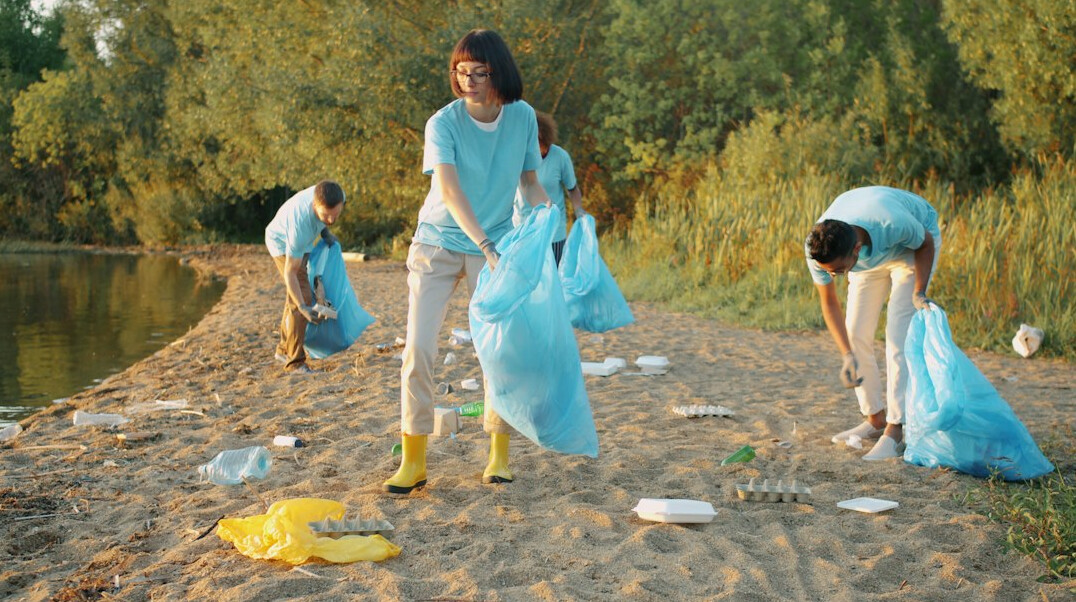 volunteers cleaning river